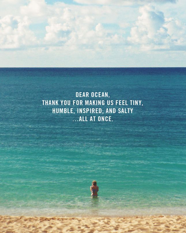 a person standing in the ocean with a quote on it that says, dear ocean thank you for making us feel tiny, humble, inspired, and salty all at once