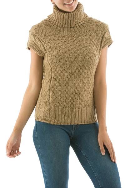 Susi Sillau designs a sweater of flirty elegance knit of a soft alpaca blend for extraordinary warmth. The chic beige sweater features a cozy turtleneck and short sleeves. Knit Short Sleeve Sweater For Fall, Knit Sweater With Short Sleeves For Fall, Short Sleeve Knit Sweater For Fall, Brown Knit Short Sleeve Sweater, Brown Short Sleeve Knit Sweater, Stretch Knitted Short Sleeve Sweater, Short Sleeve Textured Knit Top For Winter, Beige Knitted Short Sleeve Sweater, Cable Knit Short Sleeve Top