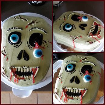 a cake decorated to look like a zombie face with blue eyes and blood running down the side