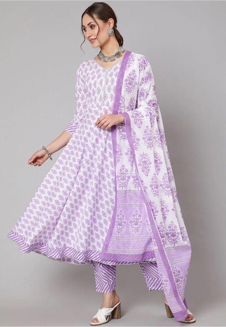 Pure Cotton Anarkali Kameez in White This Readymade attire is Enhanced with Floral Print and Gota Lace Work. Crafted in V Neck and Quarter Sleeve Available with a Pure Cotton Pant in Light Purple and White and a Poly Cotton Dupatta in White The Kameez and Bottom Lengths are 46 and 38 inches respectively Do note: Accessories shown in the image are for presentation purposes only and length may vary upto 2 inches.(Slight variation in actual color vs. image is possible). Simple Anarkali Suits, White Salwar Suit, Purple Anarkali, Simple Anarkali, Cotton Anarkali Suits, Full Sleeves Design, Pakistani Kurta, Vs Image, Designer Anarkali Dresses