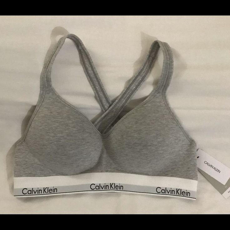 Grey Calvin Klein Sports Bra Sizexl Never Worn It Was Too Small Supportive Calvin Klein Activewear For Workout, Calvin Klein Sporty Activewear With Medium Support, Calvin Klein Medium Support Sports Bra For Workout, Calvin Klein Fitted Sports Bra For Athleisure, Calvin Klein Fitted Athleisure Sports Bra, Calvin Klein Fitted Sports Bra, Calvin Klein Sporty Activewear For Gym, Calvin Klein Sporty Fitted Sports Bra, Calvin Klein Casual Activewear For Gym