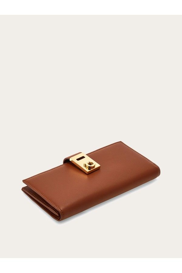 Shop the Hug continental wallet Cognac on Ferragamo.com. Discover the iconic collection on our official online shop now. Free Delivery. Elegant Bifold Wallet For Office, Elegant Brown Clutch With Smooth Grain, Elegant Brown Clutch With Leather Lining, Chic Brown Business Wallet, Elegant Travel Wallet With Fold Over Clasp, Elegant Leather Wallet With Smooth Grain, Luxury Cognac Wallets With Interior Card Slots, Luxury Cognac Wallet With Interior Card Slots, Elegant Bifold Wallet With Smooth Grain