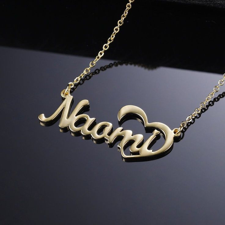 Design your own one-of-a-kind necklace with your name or a special word up to 13 characters. Each necklace is carefully made of quality Silver Stainless Steel (gold plating available). Details: Available in Silver Stainless Steel or Silver Stainless Steel with Gold Plating It does NOT Tarnish Or Rust (100% guaranteed) FREE Gift Boxing Included! Your personalized pendant takes time to hand craft and test but when you're wearing it you'll know it was worth the wait. :) ORDER NOW AND RECEIVE FREE S Customized Nameplate Necklaces For Anniversary, Customizable Yellow Gold Name Necklace For Anniversary, Custom Yellow Gold Names Necklace For Gifts, Customized Nameplate Jewelry For Anniversary Gift, Nameplate Necklace For Anniversary, Nameplate Necklace For Anniversary Gift, Customized Rose Gold Name Necklace For Anniversary, Anniversary Gift Nameplate Necklace, Nameplate Necklace With Names For Anniversary Gift