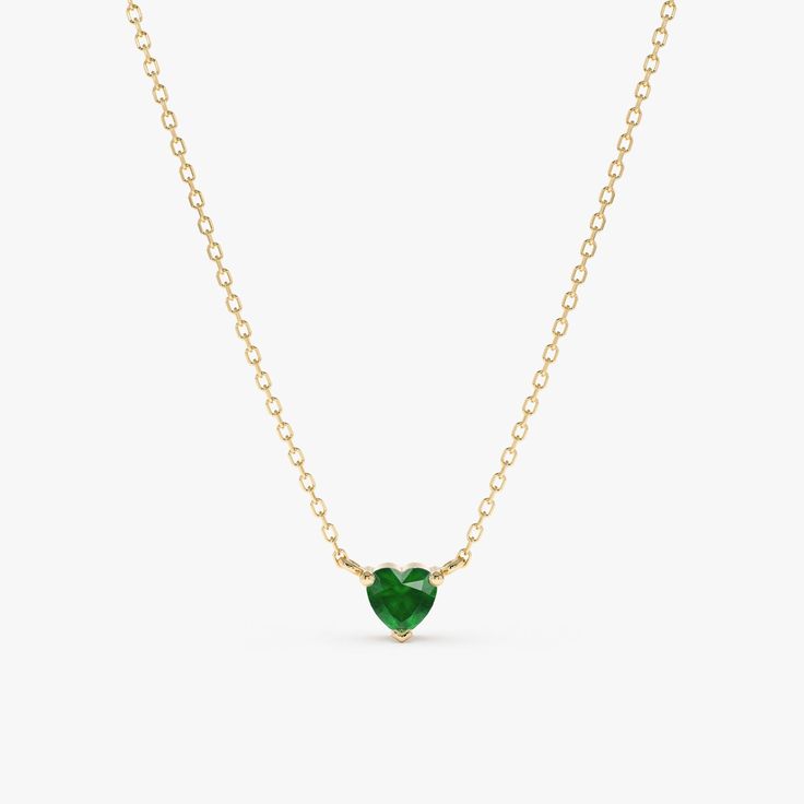 This stunning necklace features a beautiful heart-shaped emerald gemstone suspended from a dainty gold chain (available in yellow, rose, or white gold). The rich green emerald is a captivating symbol of love and growth, making this necklace a perfect choice for any occasion. - Handmade - Solid Gold - Natural Emerald - Pendant Size: 5 mm - Total Emerald Carat Weight: 0.40 ctw 🛠 Your Sarah Elise piece is handcrafted with care! Ready-to-ship items go out within 3 business days. Made-to-order pieces typically take 7-10 business days to create. If you need something sooner, please contact us - we'll see if we can make it happen! For estimated shipping dates and tracking, check your Etsy account under 'Orders'. 🚐Orders under $100 are sent with USPS First Class Mail tracking; orders more than $ Heart-shaped Emerald Necklace For Gift, Heart Cut Emerald Necklace For Gift, Heart-shaped Emerald Necklaces As A Gift, Heart-shaped Emerald Necklaces For Anniversary, Heart Shaped Emerald Necklace As A Gift, Heart-shaped Emerald Necklace As A Gift, Emerald Heart Gemstone Necklace, Heart-shaped Green Emerald Necklace As Gift, Heart-shaped Emerald Necklace For Anniversary