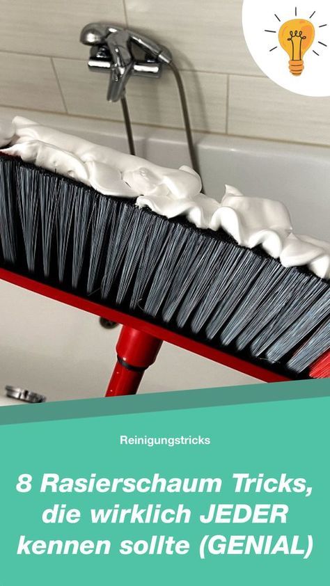 a red brush sitting on top of a sink under a faucet