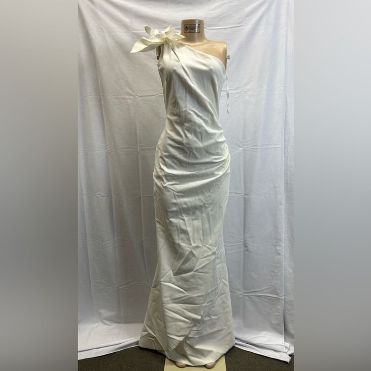 This Item Is New With Tags . Has A Few Stains . To Prevent Any Illegal Store Returns There Is A Line Through The Designer Name. White Maxi Dress With Asymmetrical Neckline For Evening, Elegant White One-shoulder Evening Dress, Elegant White One Shoulder Evening Dress, White Gown With Asymmetrical Neckline For Party, White Sleeveless One-shoulder Evening Dress, White Sleeveless One Shoulder Evening Dress, White One-shoulder Evening Maxi Dress, White One Shoulder Evening Maxi Dress, Chic White One-shoulder Gown