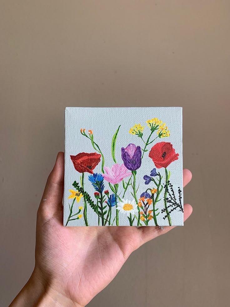 Wildflowers on 4x4” stretched canvas Painted Wildflowers Acrylic, 4x4 Acrylic Paintings, Wildflowers Canvas Painting, Tiny Painting Ideas On Canvas, Square Small Canvas Paintings, Painting On 4x4 Canvas, Cute Square Paintings, Small Square Acrylic Painting, Flower Small Painting