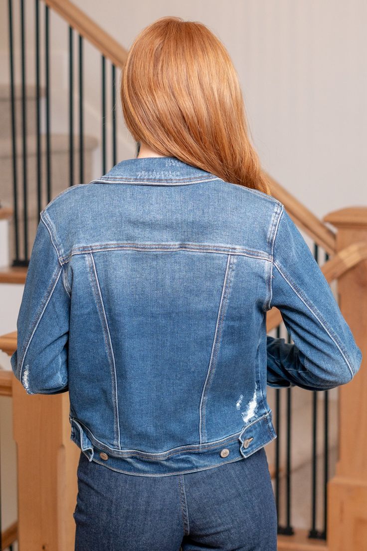 Judy Blue Cameron Denim Jacket - The wardrobe essential with a touch of edge. This jacket features classic denim styling with distressed detailing, adding a trendy and rugged vibe to your look. Perfect for effortlessly elevating your casual outfits and bringing a cool, laid-back element to your wardrobe. Color: Dark Blue Length: 21.5"* Material: 76.2% Cotton, 22.5% Polyester, 1.3% Spandex Stitching: Classic Fly: Zipper Style #: JB7859 | 7859 *Measured on the smallest size, measurements may vary Everyday Distressed Medium Wash Denim Jacket, Trendy Dark Wash Denim Jacket, Fitted Dark Wash Outerwear With Frayed Hem, Trendy Dark Wash Denim Jacket For Everyday, Casual Ripped Denim Jacket, Fitted Outerwear With Frayed Hem, Everyday Light Wash Distressed Denim Jacket, Fitted Distressed Dark Wash Outerwear, Casual Distressed Dark Wash Denim Jacket