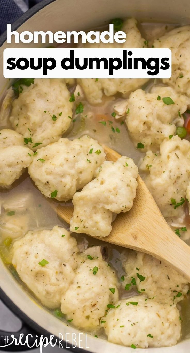 homemade soup dumplings in a white pot with a wooden spoon and text overlay that reads homemade soup dumplings