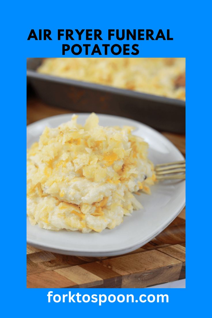 a white plate topped with mashed potatoes next to a baking pan