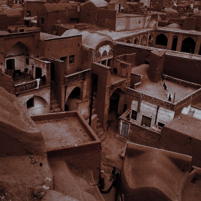 an aerial view of a village in the desert