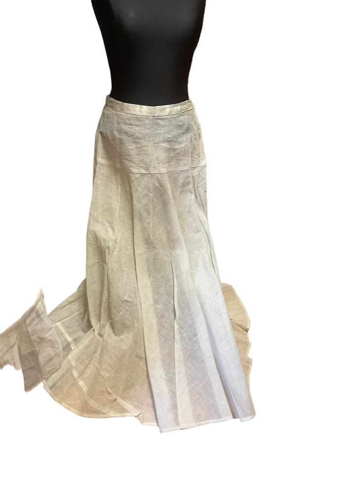 "This is a gauze petticoat up for review.  The skirt features a 1\" waist band; the panel is 6\" from the waistband; the skirt is 30\" long; the bottom is almost 120\" around; the skirt fastens at the side with a single hook and eye." Fitted Linen Wrap Skirt With Lining, Stretch Full Skirt Petticoat With Ruffled Detail, Stretch Full Petticoat With Ruffled Skirt, Fitted Full-length Gathered Bottoms, Fitted Full-length Gathered Skirt, Spring Long Skirt Petticoat With Attached Cancan, Long Flowy Tulle Petticoat, Fitted Flared Linen Skirt, Fitted Linen Flared Skirt