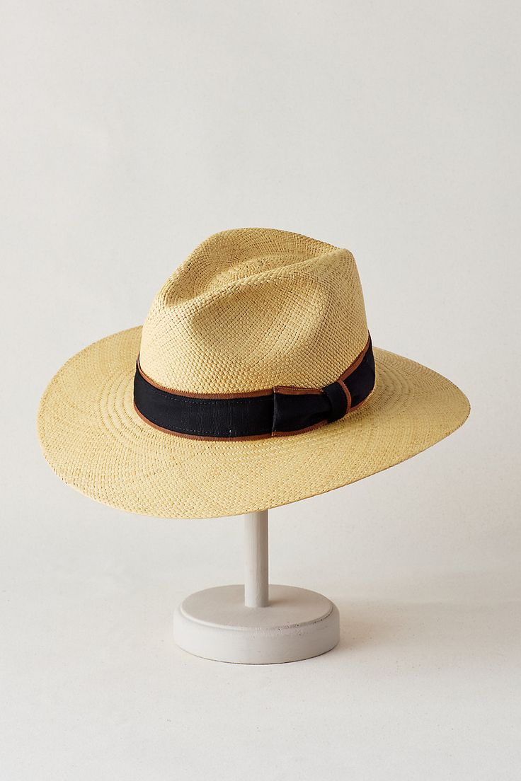 Wherever you're going, you'll be noticed and protected in the Chateau Fedora hat. Hand woven of lightweight, bleached straw from Ecuador, this dashing hat keeps you cool, ventilated, and shaded from the sun with its 3" downturn brim. The pinch-front crown is accented with a grosgrain ribbon finished with a bow, and the interior sweatband lends a soft, stretchy feel to everyday wear. Woven Panama Hat With Curved Brim, Woven Fedora In Toquilla Straw, Woven Toquilla Straw Fedora Hat, Woven Toquilla Straw Fedora, Woven Fedora Hat In Toquilla Straw, Kentucky Derby Woven Wide Brim Panama Hat, Summer Short Brim Panama Hat For Outdoor, Beige Woven Panama Hat For Kentucky Derby, Kentucky Derby Wide Brim Woven Panama Hat