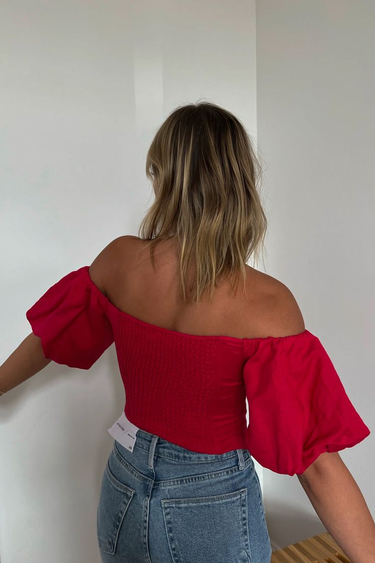 Off the shoulder puff sleeve top with gathered back. Off-shoulder Ruched Blouse For Night Out, Ruched Off-shoulder Blouse For Night Out, Trendy Balloon Sleeve Tops For Day Out, Balloon Sleeve Tops With Gathered Sleeves For Day Out, Chic Puff Sleeve Tops With Elastic Shoulders, Trendy Ruched Off-shoulder Tops, Ruched Stretch Off-shoulder Blouse, Stretch Ruched Off-shoulder Blouse, Stretch Off-shoulder Tops With Elastic Shoulders