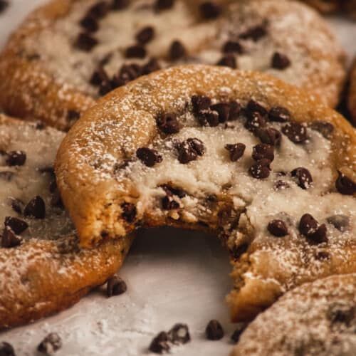 chocolate chip cookies are cut in half and stacked on top of each other