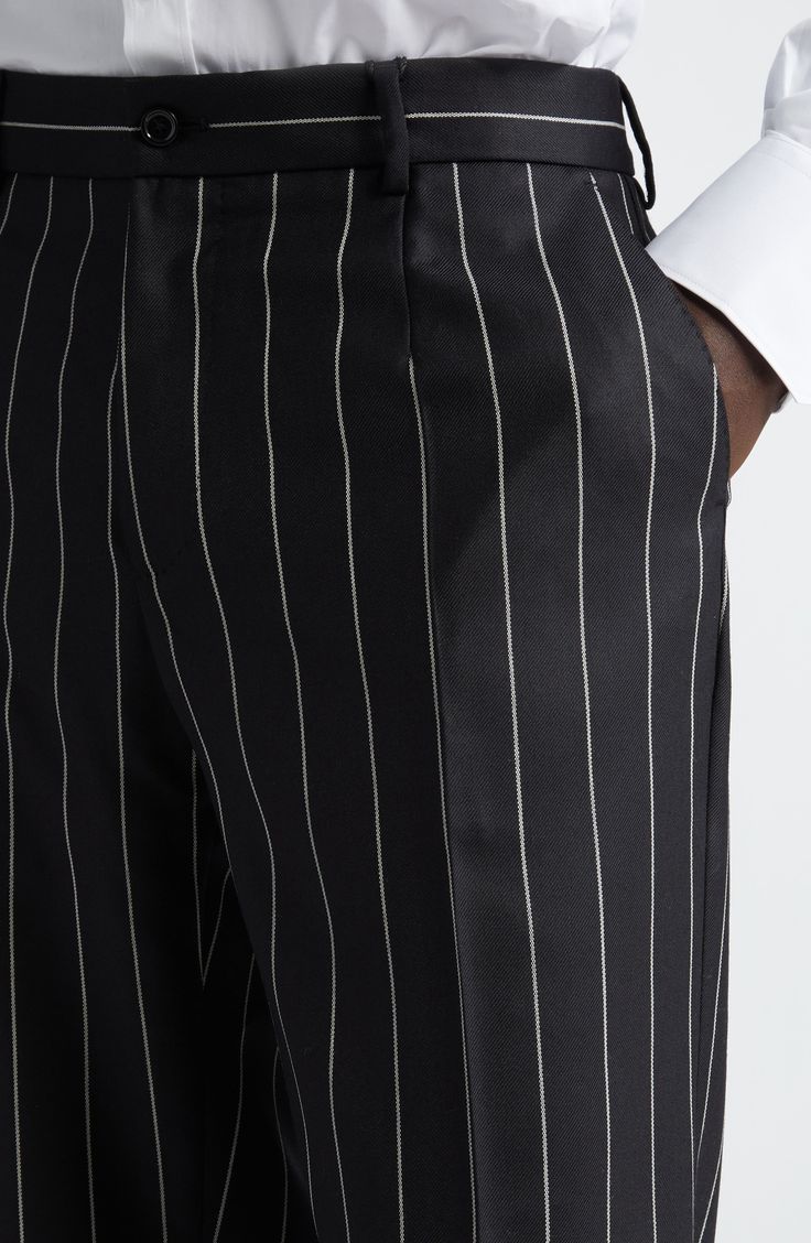 Polished pinstripes bring this season's pared-down precision to runway-featured trousers tailored in Italy from pure wool. Zip fly with button closure Front slant pockets; back button-welt pockets 100% wool Dry clean Made in Italy Designer Clothing Luxury Pinstripe Elegant Bottoms, Luxury Pinstripe Casual Bottoms, Luxury Pinstripe Pants With Pockets, Luxury Pinstripe Men's Bottoms, Mens Wool Trousers, Luxury Pinstripe Wide-leg Bottoms, Pinstripe Pants, Tapered Trousers, Wool Trousers