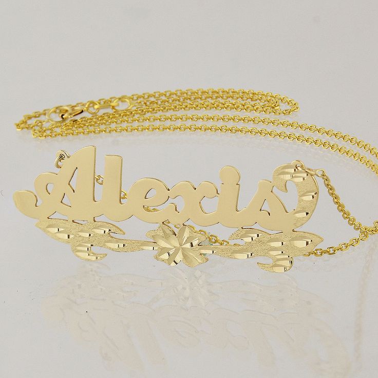 "*Average Name Pendant Width : 1 7/8 Inch (4.8 cm) Approx. *Up to 9 Letters. *Pendant Thickness : 0.5 mm / 25 Gauge / 0.020\" *Premium high end quality personalized laser cut out any letters/numbers in 10kt or 14kt solid yellow or white gold personalized name necklace, this item comes with split sturdy 1.0 mm Rollo chain from 15~20 inches, name pendant length not included on length option. *This pendant cut out by latest technology laser machine, top quality guaranteed." Elegant Name Necklace With Flower Pendant, Anniversary Flower Pendant Necklace With Polished Finish, Gold Polished Nameplate Jewelry, Personalized Gold Jewelry With Polished Finish, Personalized Nameplate Jewelry With Polished Finish, Custom Engraved Gold Plated Nameplate Necklace, Gold Sterling Silver Name Necklace With Polished Finish, Gold Polished Sterling Silver Name Necklace, Fine Gold Nameplate Jewelry