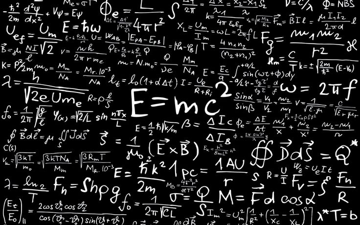 the word emc written in white chalk on a blackboard with lots of calculations