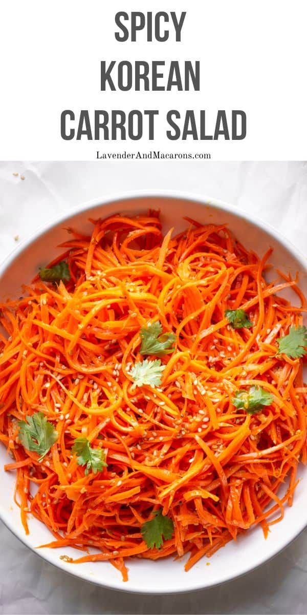 a white bowl filled with carrot salad and topped with cilantro