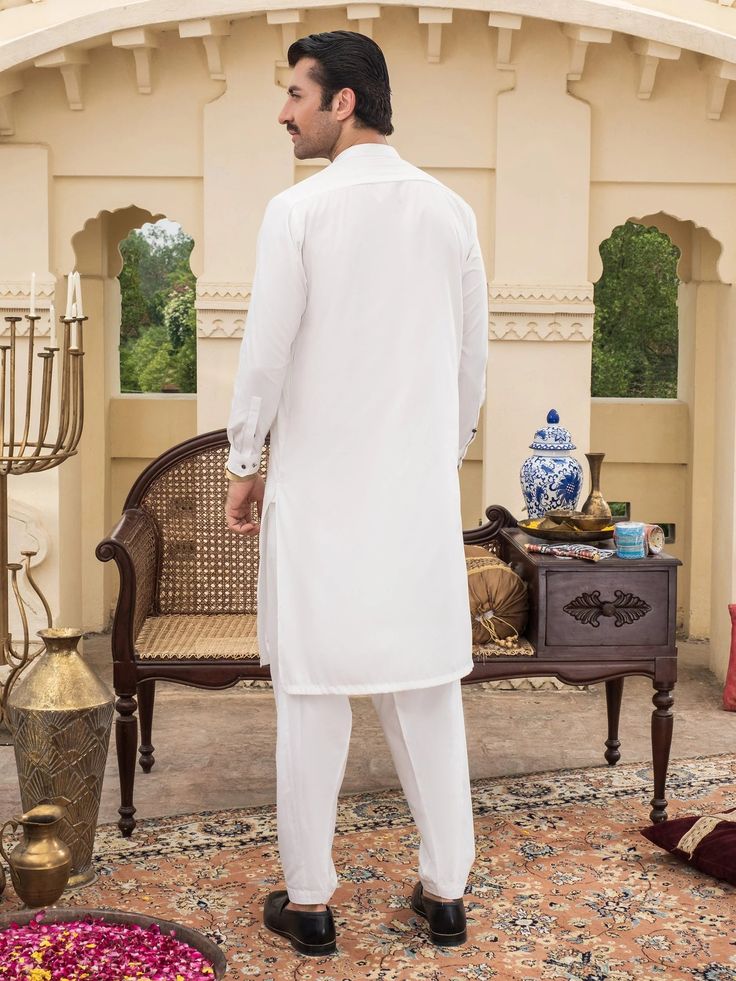 KurtaDyed kurtaTwo side pocketsFull sleeves with cuffsFabric: Wash And WearShalwarDyed shalwarFabric: Wash And WearOther DetailsWeight: 494 gModel is wearing a size 'S'Code: P8867SK-XSS-WHTCare InstructionsWash light and bright colors separately. Do not bleach. Do not twist/wring, warm iron to sequined, beaded, and delicate fabrics. Do not dry in direct sunlight.DisclaimerActual colors of the product may vary from the colors being displayed on your device Wedding Branding, Free Offer, Formal Wedding, White Wash, Sale House, Women Girl, Bright Colors, Bleach, Twist