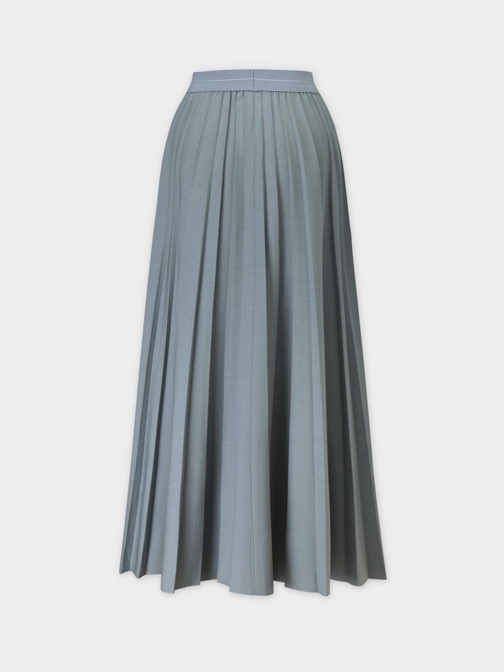 This Pleated Skirt in Slate Blue features a flattering 37 inch length. The pleated design adds dimension to your look, while the rich color adds a touch of sophistication. Solid Pleated Skirt With Stretch, Solid Stretch Pleated Skirt, Solid Stretch Pleated Skirt With Pleated Hem, Pleated Stretch Skirt With Pleated Hem, Elegant Blue Pleated Skirt With Accordion Pleats, Spring Blue Skirt With Accordion Pleats, Chic Blue Skirt With Accordion Pleats, Chic Blue Accordion Pleated Skirt, Flowy Solid Pleated Skirt