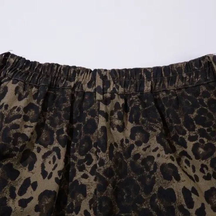 Expertly crafted with a striking leopard print design, these unique shorts are a must-have for any fashion-forward individual. Made from high-quality materials, these shorts are not only stylish but also comfortable and durable. Elevate your wardrobe with these statement-making shorts. FEATURES Made from a super soft blend of cotton and polyester Unisex item NOTE: Please refer to our size chart below before placing your order. Leopard Print Summer Shorts, Leopard Print Shorts With Built-in Shorts, Trendy Leopard Print Shorts, Leopard Print Bottoms With Built-in Shorts, Trendy High-waisted Leopard Print Shorts, Leopard Print Cotton Shorts For Summer, Summer Leopard Print Cotton Shorts, Cargo Pants Design, Low Pants