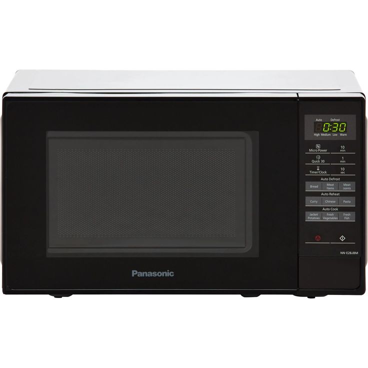 a panasonic microwave oven with the time displayed