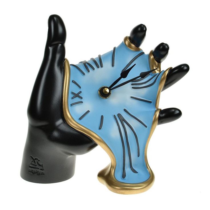 a blue and black clock on top of a hand shaped object with one hand extended up to the other