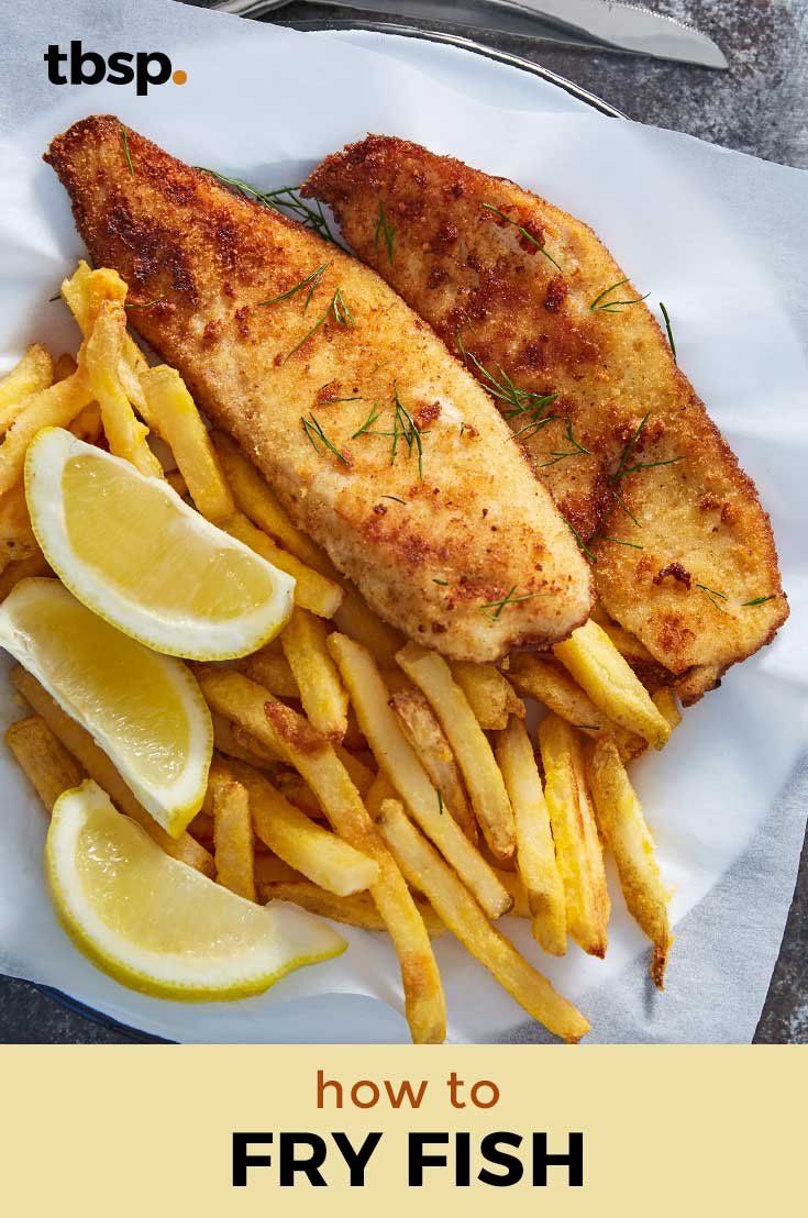 fish and french fries on a plate with lemon wedges next to the words how to fry fish