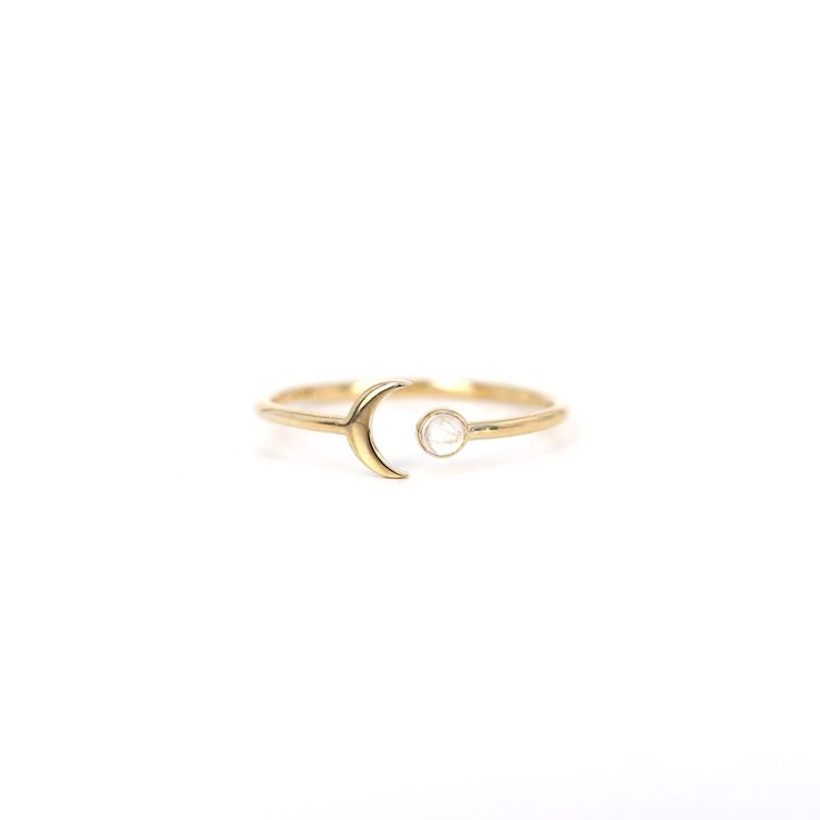 Crescent Moon Moonstone Open Ring Band, 10K 14K Solid Gold Ring Band, Dainty Unique Open Ring, Natural Moonstone Ring, Stackable Rings * Handmade / Handcrafted Fine Jewelry Band Thickness: 1.30 mm Stone: 100% Natural Moonstone (2.5mm stone) Metal: Solid 10K, 14K Gold Gold Color: White gold, Rose gold, Yellow gold ≫ Please read our FAQ below for more detail. Dainty Gold Rings With Moon Phase, Dainty Gold Moon Phase Rings, Gold Moon Shaped 14k Gold Ring, Moon Shaped 14k Gold Ring, 14k Gold Moon Shaped Ring, 14k Gold Moon Shaped Promise Ring, Gold Moon-shaped 14k Gold Ring, Celestial 14k Gold Crescent Ring, Celestial Crescent 14k Gold Ring