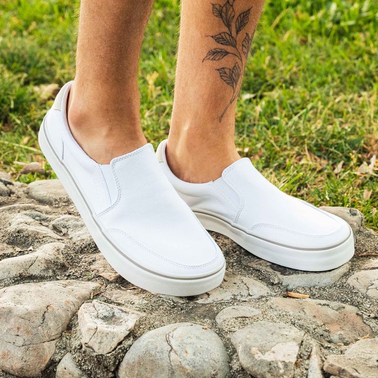 Nothing says your ready for summer quite like a classic white pair of slip-ons! In the STREESTYLE Slip-On Cloud you are bright and fun and confident with no effort needed. Embrace the bright side of summer with a modern barefoot slip-on that is wide, flexible, and extremely comfortable. Summer Slip-on Sneakers With Vulcanized Sole, Summer Slip-ons With Rubber Sole, White Slip-ons For Beach In Spring, Summer Slip-on Sneakers, White Slip-ons With Rubber Sole For Summer, White Slip-on Sneakers For Everyday, White Round Toe Slip-ons For Everyday, White Canvas Shoes With Rubber Sole For Everyday, Everyday White Slip-ons With Round Toe