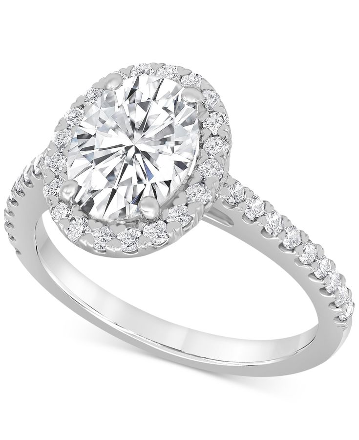 a round cut diamond ring with pave set shoulders