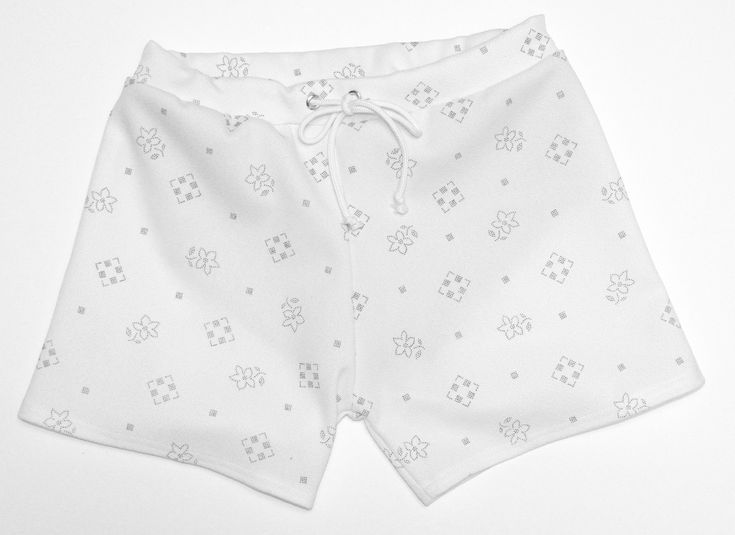 Big change coming for Frankie Four this month! By the end of June Frankie Four will be changing it's name to Fayru. Same handmade trunks, but just a new name. www.fayru.com These white swim trunks are reminiscent of 1960s swim trunks. The design is has delicate, thin line black flowers and squares. They're mid-length with a slim fit while remaining flexible and comfortable. The trunks are made from vintage stretch polyester and features a soft, breathable mesh swim liner. The waistband is elastic in the back and has a drawstring in the front, which creates an adjustable fit. These trunks feature 1 functional back pocket. To see the flattering, slim fit of Frankie Four's swim trunks, check out www.frankiefour.com. These trunks come in sizes small, medium and large. Please indicate which siz White Swim Trunks, White Swim, Black Flowers, Custom Shorts, Mens Swim Trunks, Mens Green, Man Swimming, Small Waist, Swim Trunks