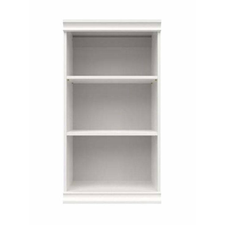 an empty white shelf with three shelves