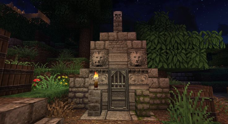 the entrance to an old stone building in minecraft