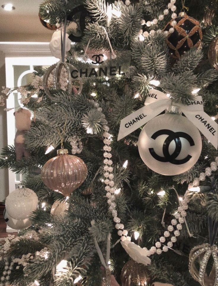 a chanel christmas tree with ornaments on it