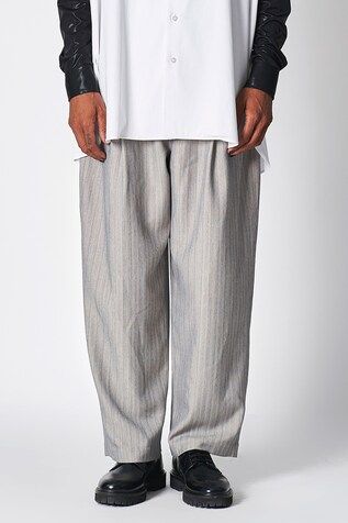 Grey oversized pant with stripe pattern and pleat details. - Aza Fashions Casual Striped Pleated Bottoms, Plisse Pants Men, Cotton Pinstripe Pants With Welt Pockets, Pleated Wide Pants Men, Men’s Pleated Pants, Pinstripe Wide-leg Pants With Pockets, Striped Pant, Casual Trousers, Stripes Pattern