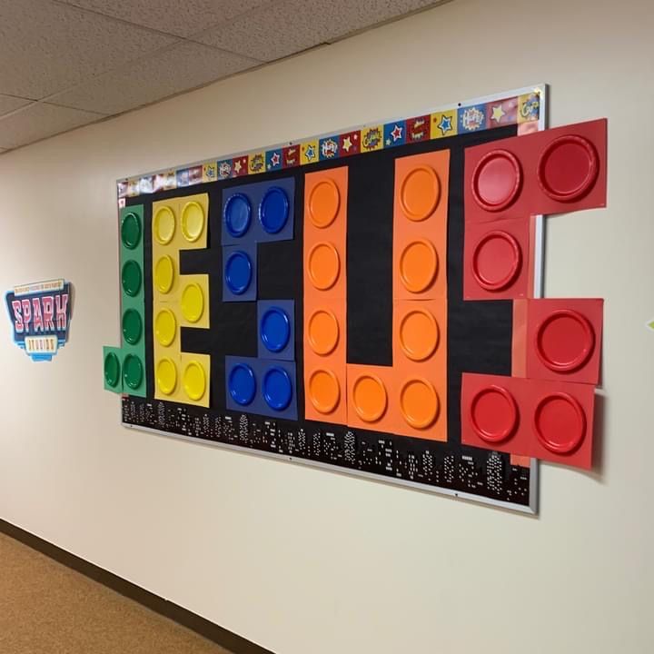 there is a large lego wall hanging on the wall