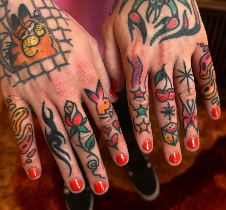 a woman with many tattoos on her hands