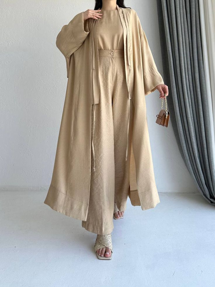 'Model Size:1' Abaya set consists of 3 different pieces. 1-Pants 2-Kimono 3-Tunic ( not long sleeves) Abaya With Pants, Cream Abaya, Open Abayas, Hijab Fashion Inspiration, Knitwear Dress, Hijab Fashion, Fashion Inspiration, Dress Skirt, Shirt Blouses