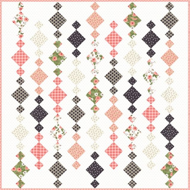 a quilt with black, white and red designs on it's border is shown