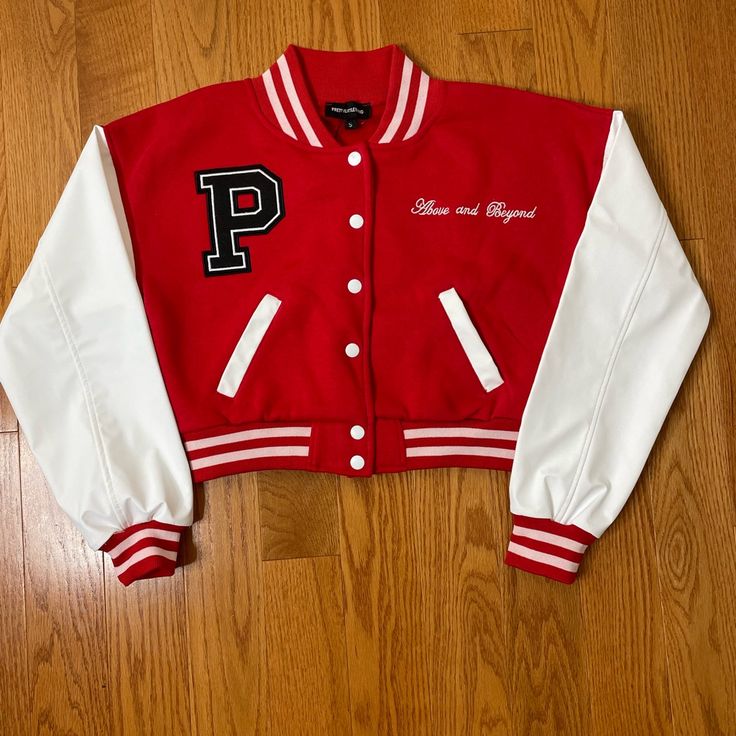 Pretty Little Thing Cropped Letterman Jacket Red Patchwork Varsity Jacket, Red Patchwork Long Sleeve Varsity Jacket, Red Letter Print Varsity Jacket For Fall, Red Long Sleeve Varsity Jacket With Patchwork, Red Varsity Jacket With Letter Print For Fall, Red Patchwork Outerwear For College, White Fitted Outerwear With Letter Print, Fitted White Outerwear With Letter Print, Red College Style Outerwear For Fall