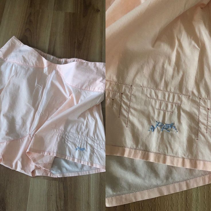 three pieces of pink clothing laying on top of a wooden floor next to each other