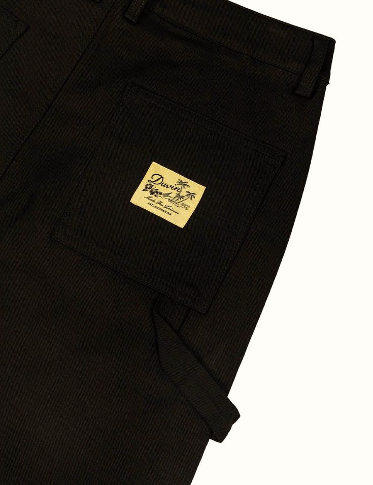 Our workwear pant in a loose fit, constructed of cotton with a little bit of stretch for added comfort. These pants have a longer Front Rise than normal so the Inseam starts a little lower than average All heights can comfortably wear the 30'' Inseam due to a scaling up Front Rise 98% Cotton / 2% Elastane Spandex Loose Fit Pre-Shrunk Pre-washed and will continue to get softer with future washes Back pocket woven label Wash cold with similar colors, dry on delicate setting Fits Loose In Hips / Le Black Jeans With Patch Pockets For Work, Baggy Cotton Pants For Work, Workwear Pants With Patch Pockets And Standard Cut Leg, Straight Hem Chinos For Streetwear With Pockets, Wide Leg Work Pants With Welt Pockets For Streetwear, Streetwear Chinos With Pockets And Straight Hem, Black Bottoms With Pockets And Standard Cut Leg, Urban Cotton Bottoms With Welt Pockets, Black Cargo Pants With Welt Pockets For Streetwear