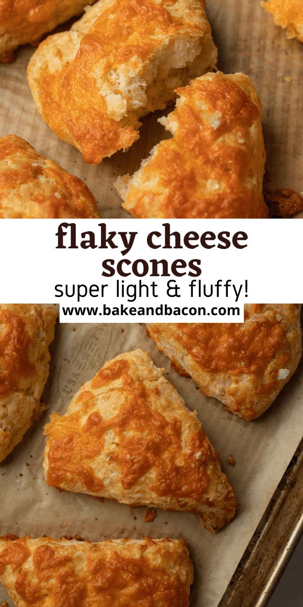 flaky cheese scones on a baking sheet with the words super light and fluffy