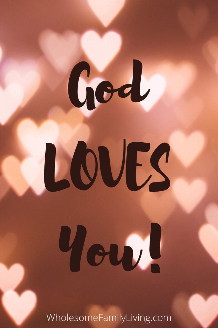 the words god loves you are written in black on a blurry background with hearts