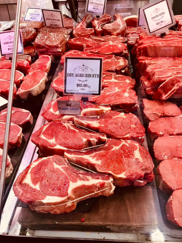 meat is displayed in the display case for sale