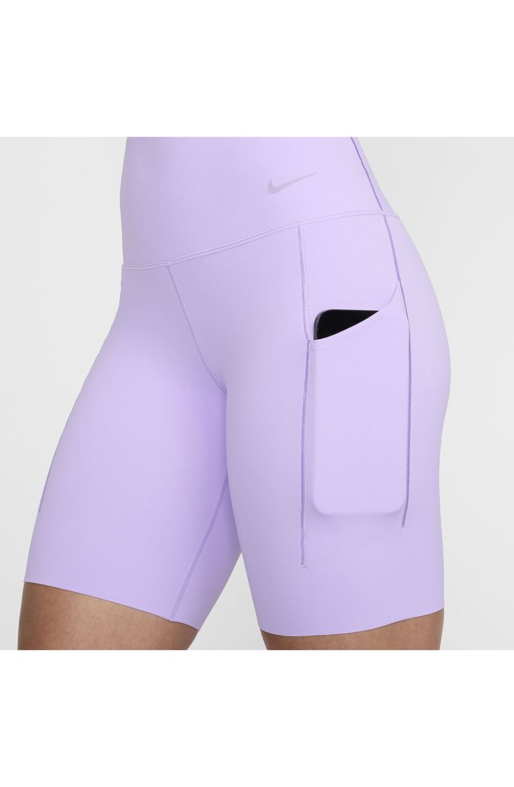 A waistband contoured with a V-shape at the back creates a smooth for these bike shorts while moisture-wicking fabric provides plenty of breathable comfort. 8" inseam Dri-FIT moisture-wicking technology 76% polyester, 24% spandex Machine wash, line dry Imported Nike Dri Fit, Bike Shorts, Moisture Wicking Fabric, Moisture Wicking, Dri Fit, V Shape, Spandex, Lilac, Nordstrom