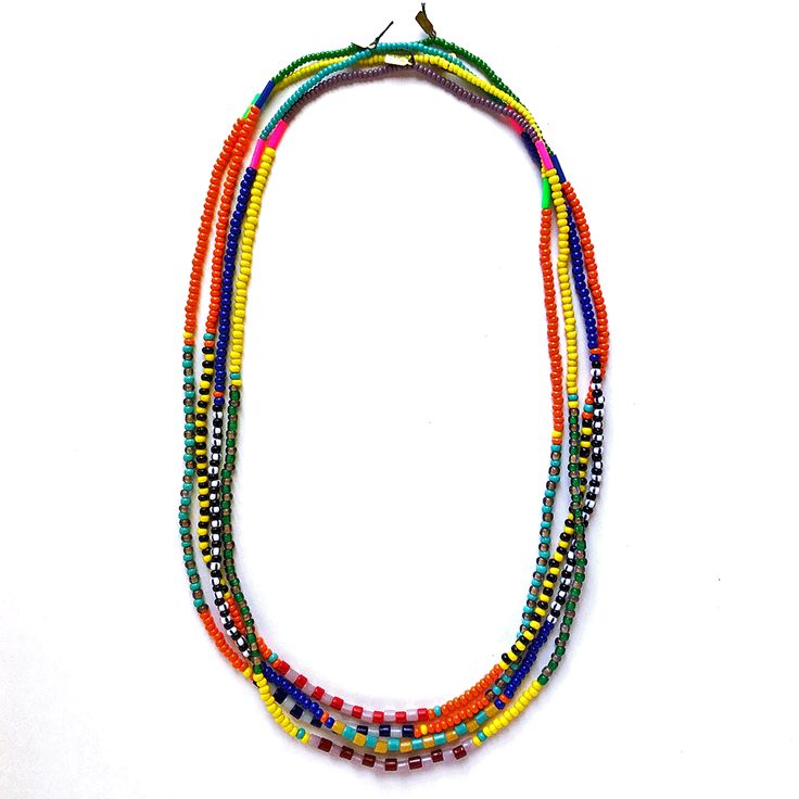 These colorful beaded necklaces are designed to look great as a single strand or mixed together in groups of two, three, four or more! We make these using vintage and new glass beads (with a few lucite pieces added in for a pop of fluorescent color) strung on a waxed poly/cotton cord. About 26" long. Handmade in the USA. Sold individually. Bohemian Multicolor Single Strand Beads, Rainbow Multi-strand Beaded Necklaces, Double Strand Colorful Beads Necklace For Jewelry Making, Multicolor Double Strand Beaded Necklace With Large Beads, Multicolor Double Strand Necklace With Large Beads, Bohemian Multicolor Single Strand Beaded Bracelets, Multicolor Long Necklace With Beaded Chain, Multi-strand Necklaces With Faceted Beads For Beach, Multicolor Double Strand Beaded Necklaces