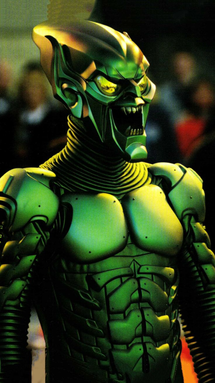 an alien man with green skin and yellow eyes is standing in front of a crowd